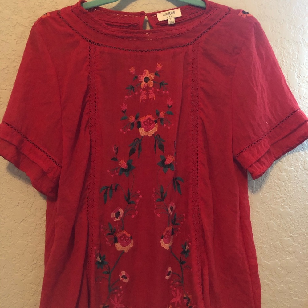 Red embroidered blouse